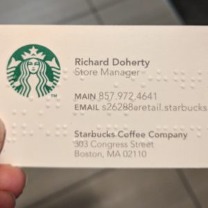 Front of a business card, showing braille embossing